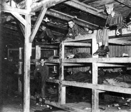 Prisoners sitting on their bunks