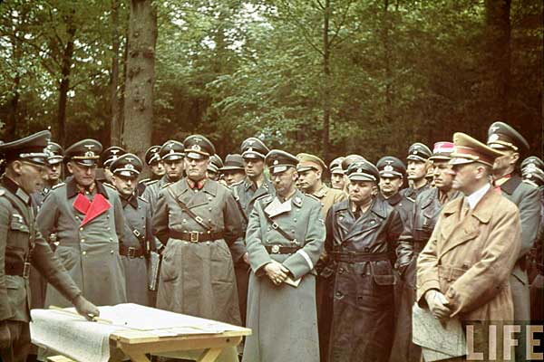 Keitel, Himmler and (leather greatcoat) Martin Bormann with Hitler